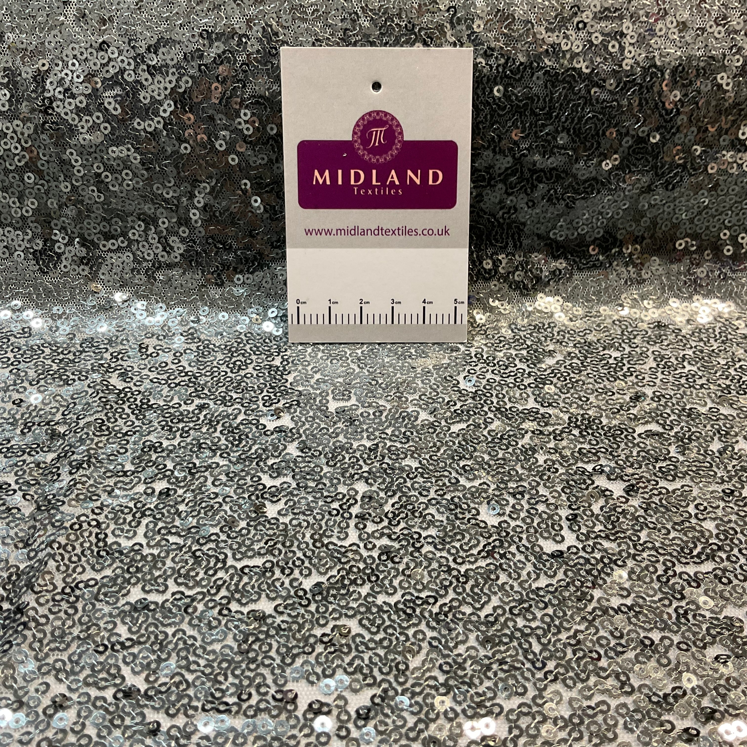 SENSATIONAL 3MM SEW ON ALL OVER SEQUINS ON NET FABRIC 50' WIDE DRESS FABRIC M1797 MTEX