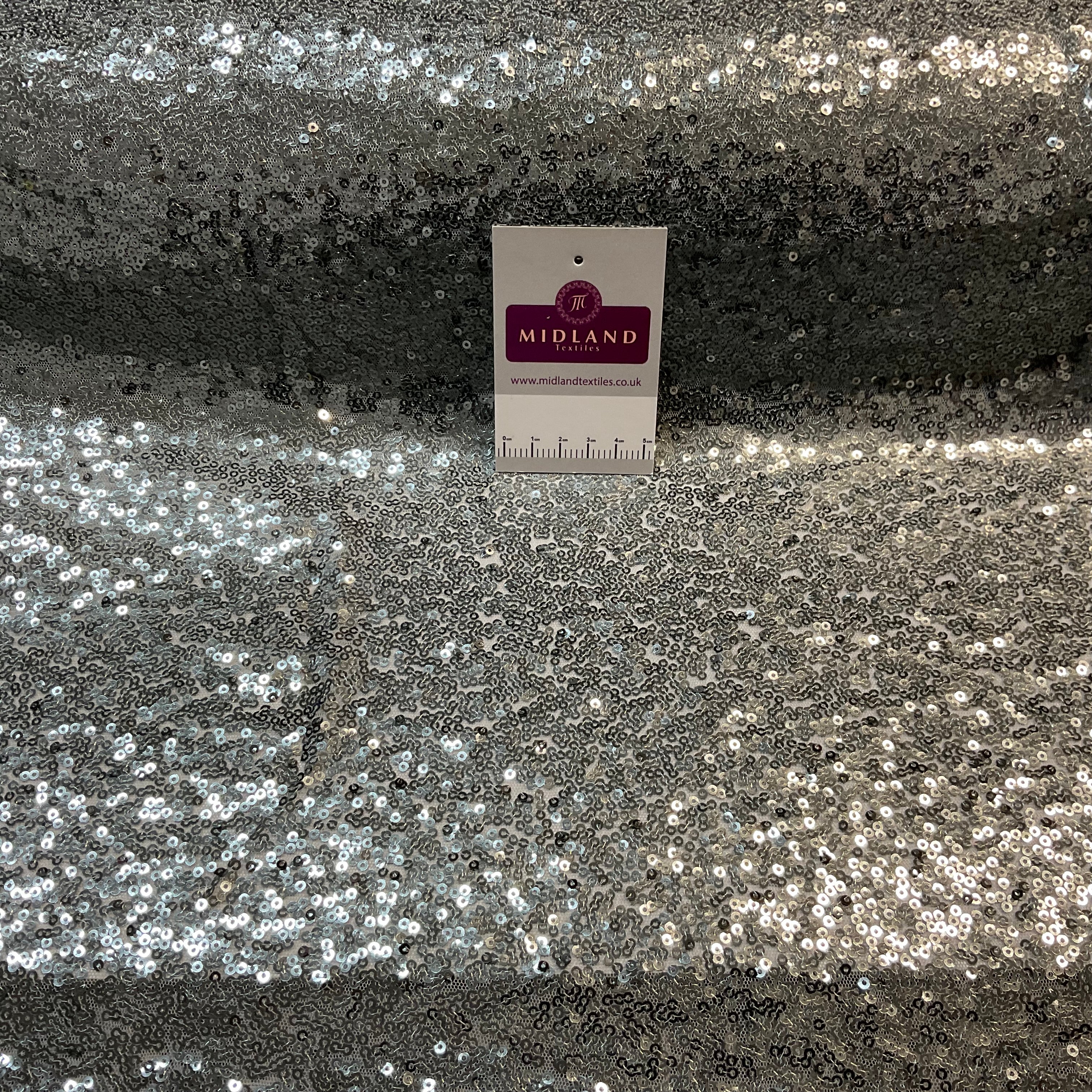 SENSATIONAL 3MM SEW ON ALL OVER SEQUINS ON NET FABRIC 50' WIDE DRESS FABRIC M1797 MTEX