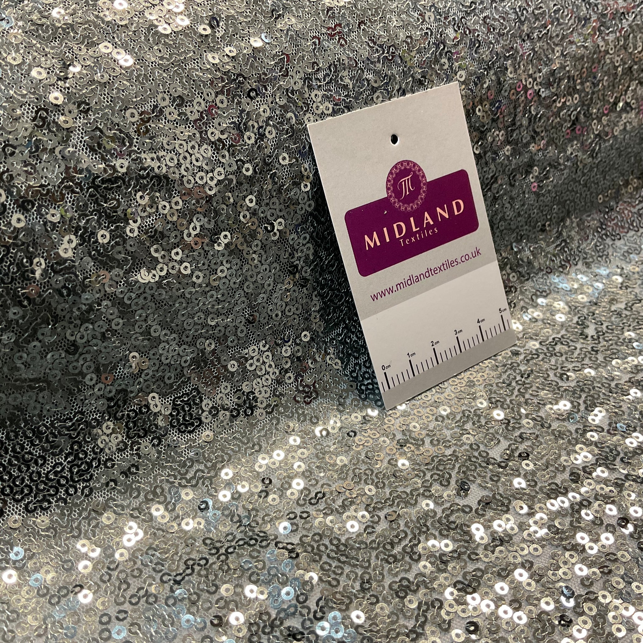 SENSATIONAL 3MM SEW ON ALL OVER SEQUINS ON NET FABRIC 50" WIDE DRESS FABRIC M1797 MTEX