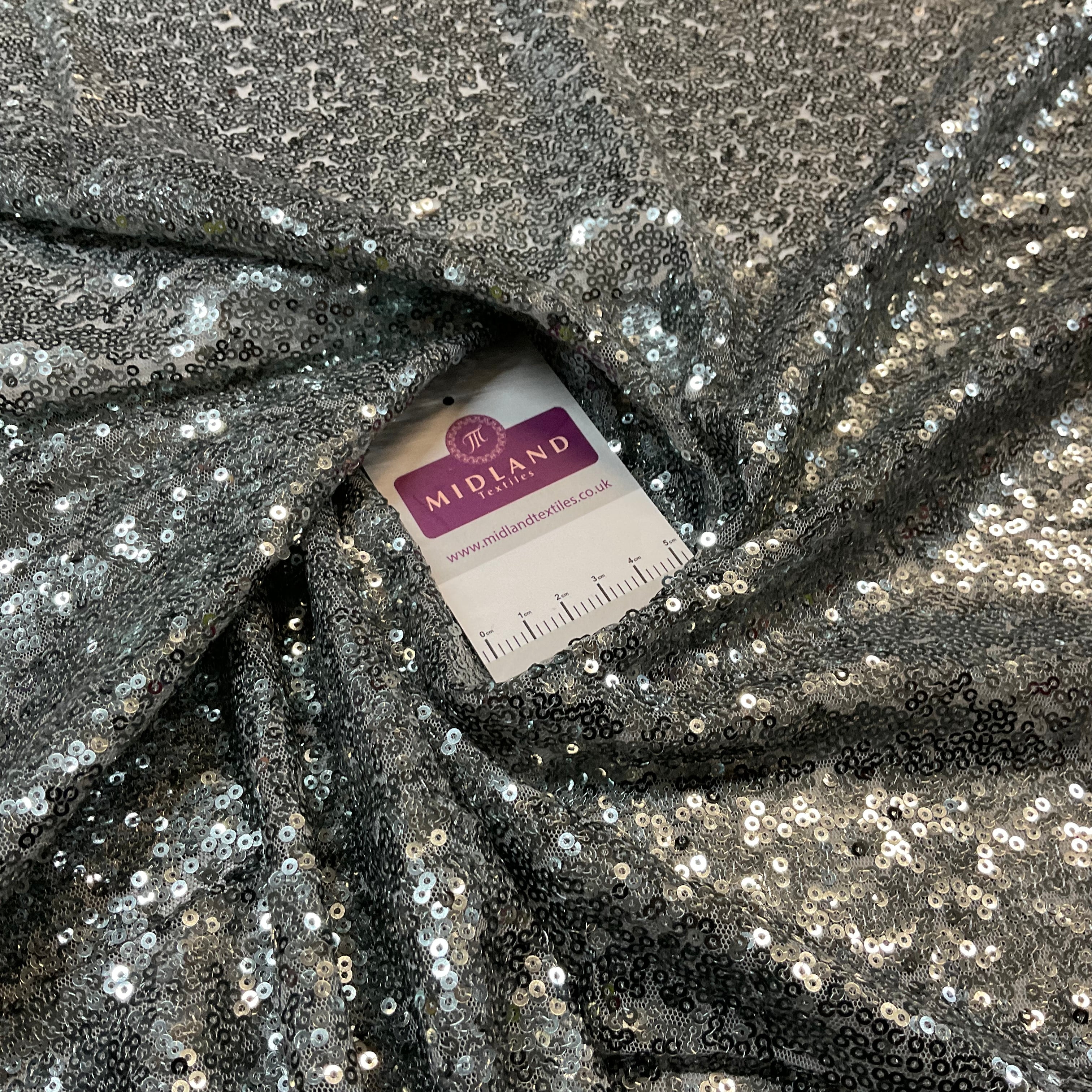 SENSATIONAL 3MM SEW ON ALL OVER SEQUINS ON NET FABRIC 50' WIDE DRESS FABRIC M1797 MTEX