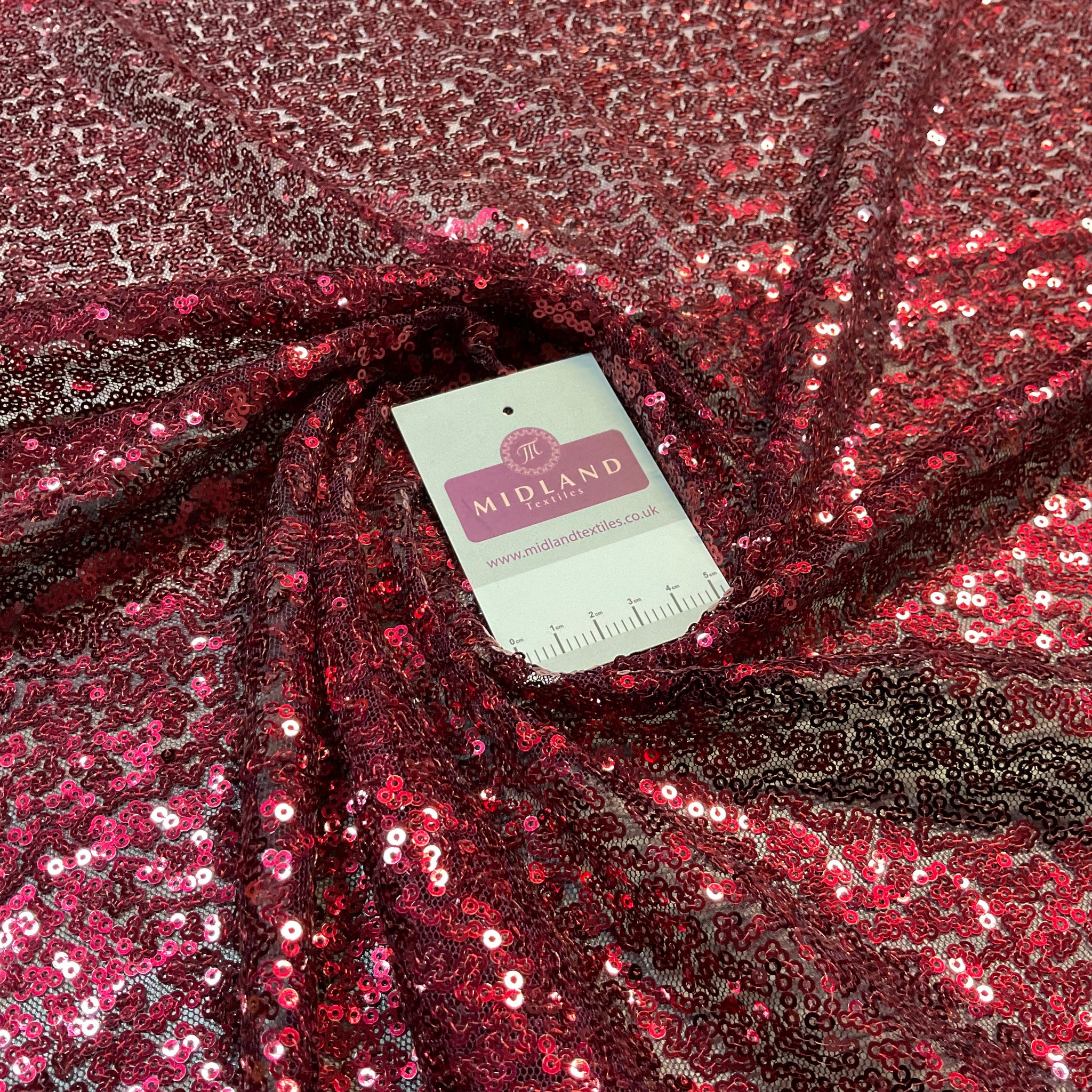 SENSATIONAL 3MM SEWN ALL OVER SEQUINS ON NET FABRIC 50" WIDE DRESS FABRIC M1797 MTEX