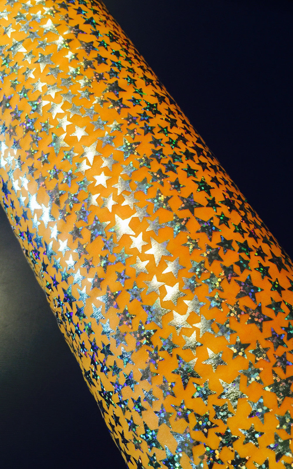 £1.99/m Sliver Hologram Star print on orange Foil Print Stretch Fabric M7-3 Mtex