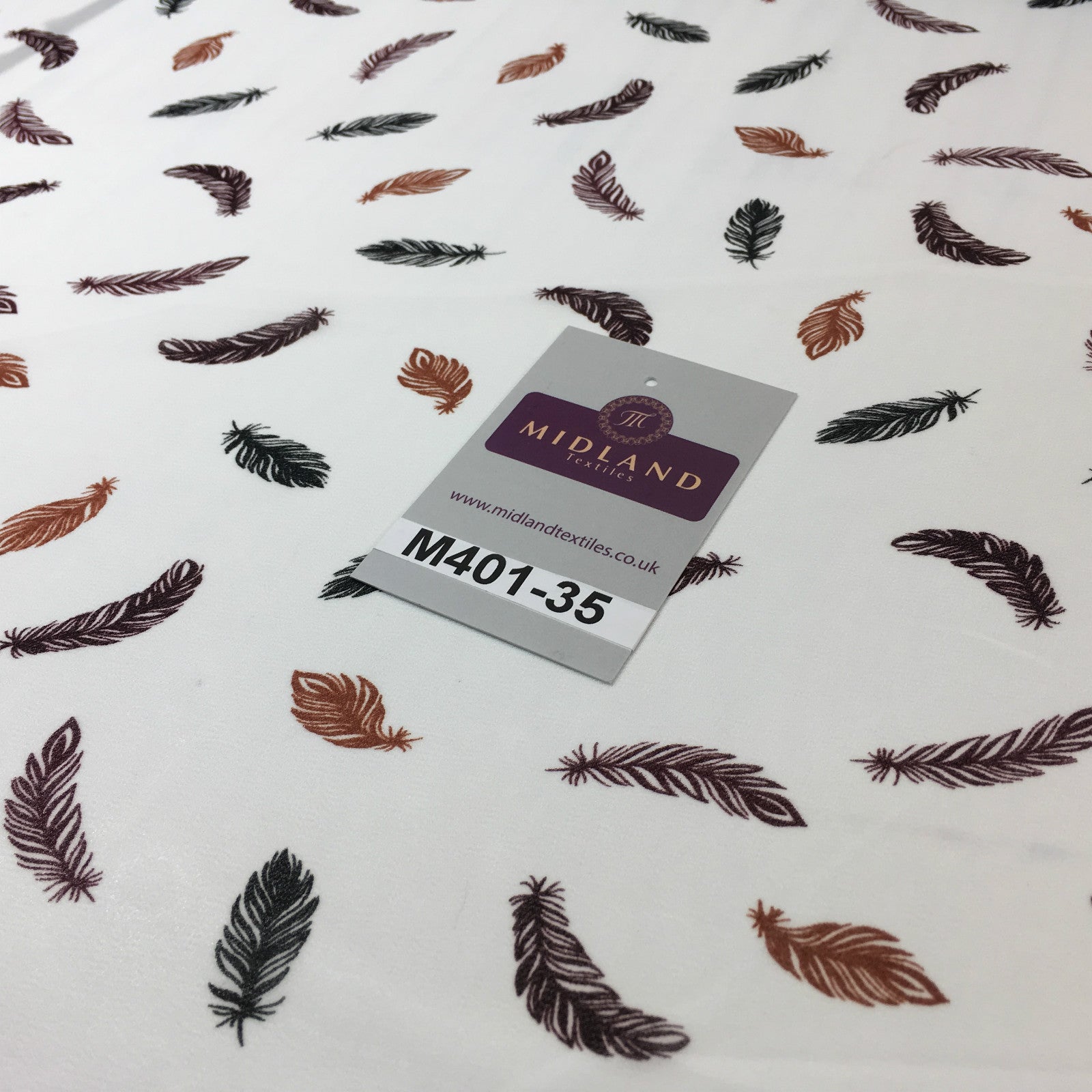 £2.99 Pearl White feather printed light chiffon georgette Fabric 58' M401-35