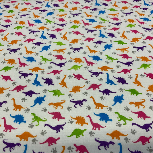 £2.50/m White Tiny Dinosaurs  Children's Poly cotton printed fabric M1637