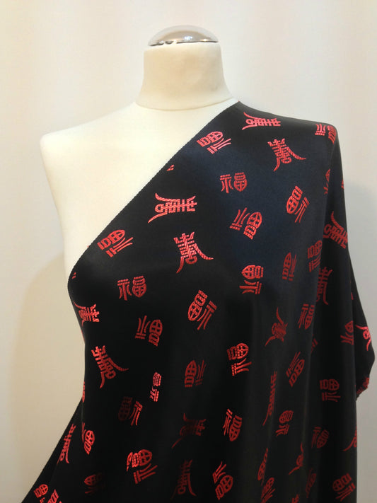 £7.99 Chinese Satin Brocade Fabric- Red Words on Black 45" Wide  - M53-2 Mtex