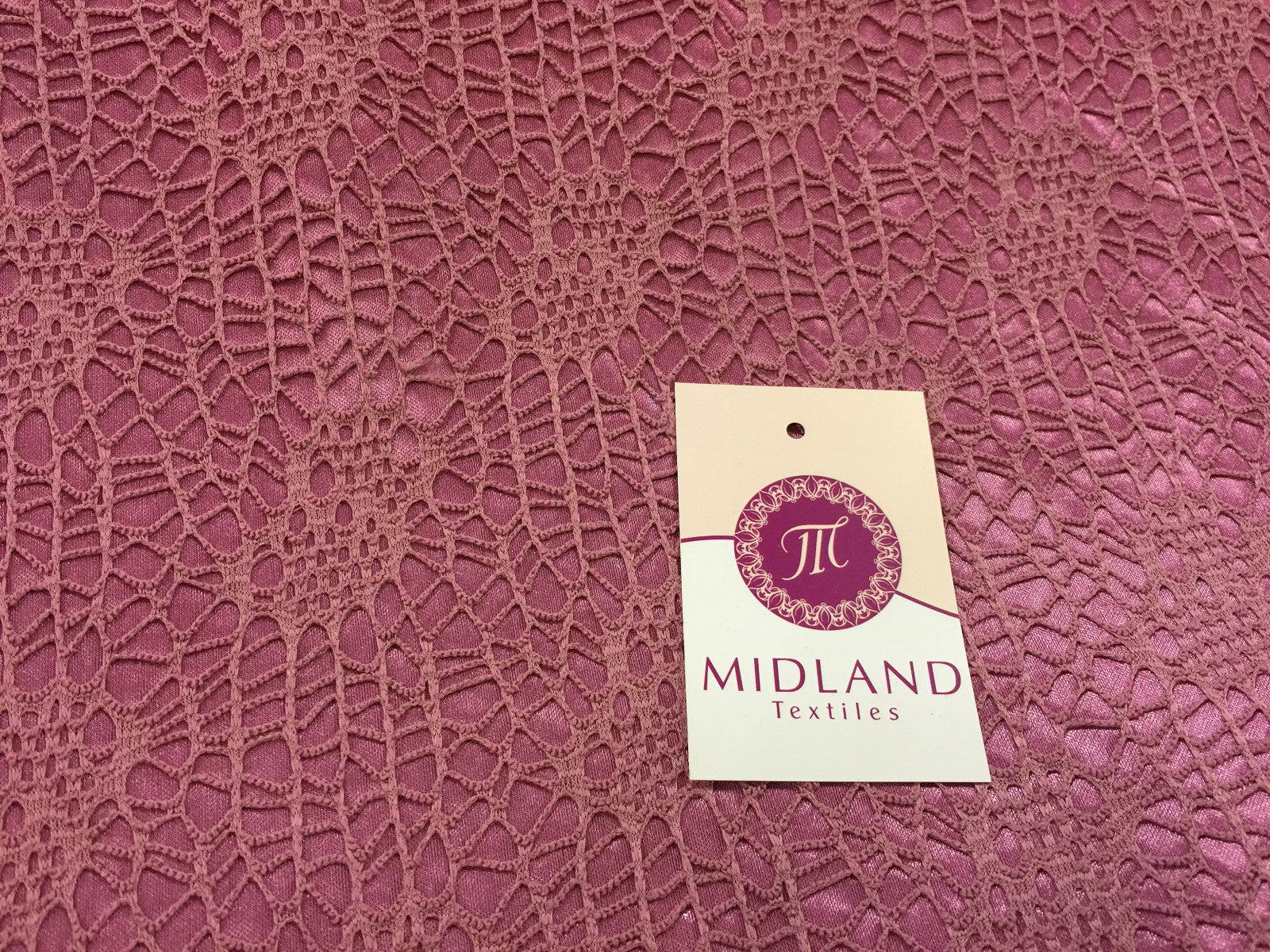 £4.99/m Floral paisley satin backed Bonded lace net 58' wide one way stretch M10