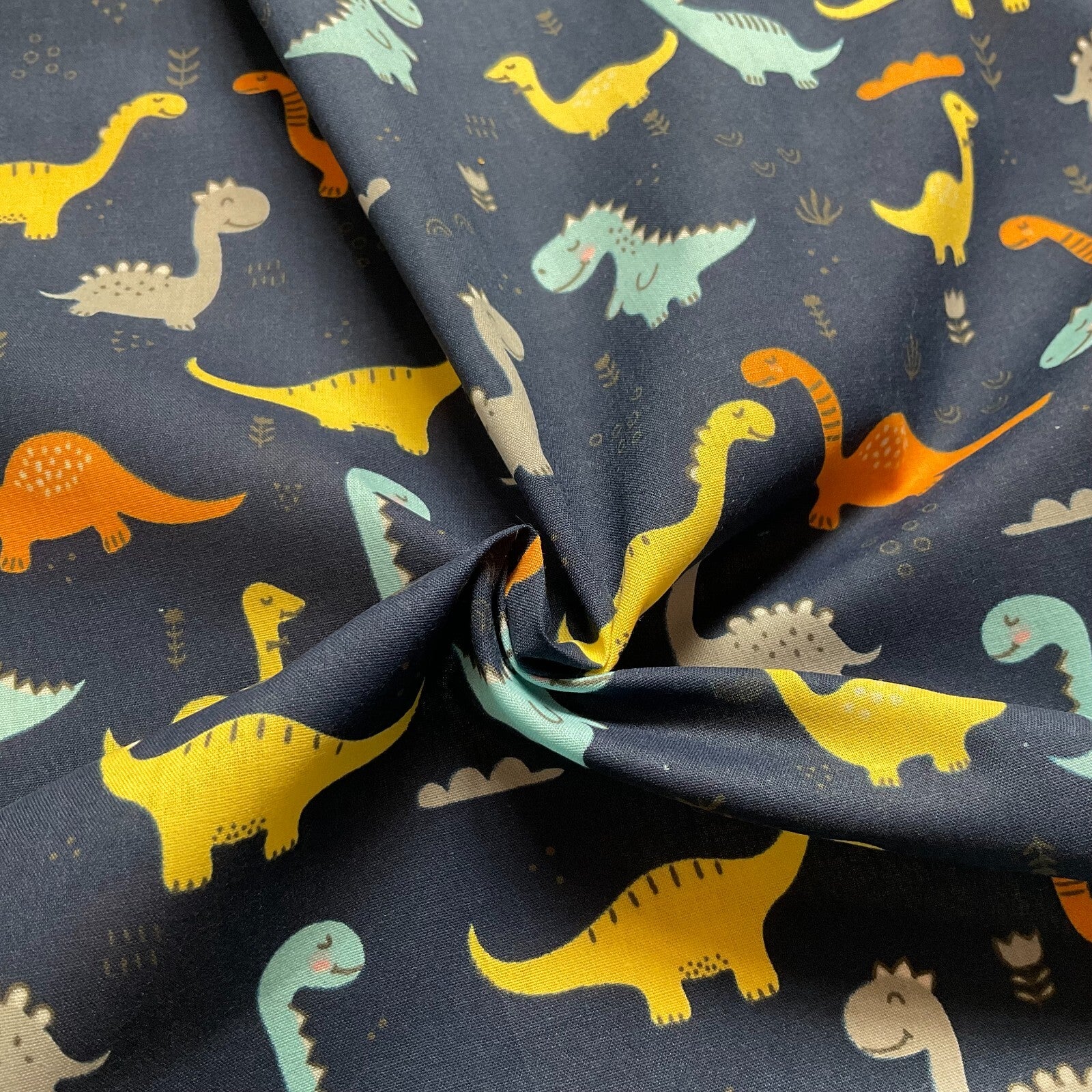 Colourful Dinosaurs Children's Poly cotton printed lightweight fabric M1644