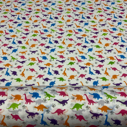 £2.50/m White Tiny Dinosaurs  Children's Poly cotton printed fabric M1637