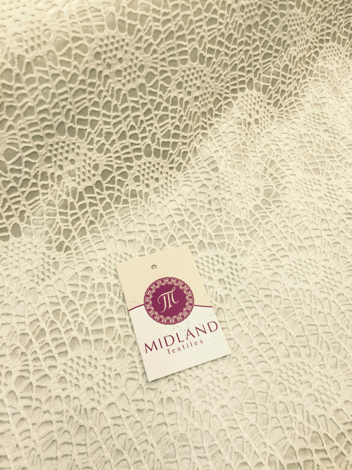 £4.99/m Floral paisley satin backed Bonded lace net 58' wide one way stretch M10