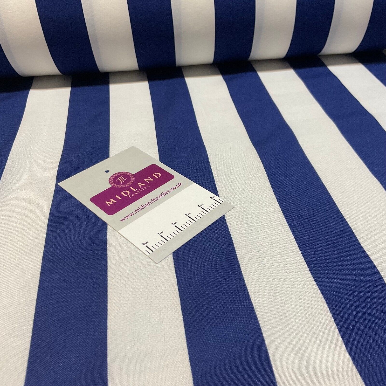 3cm wide Candy Striped peach crepe dress fabric sold by the meter M1941