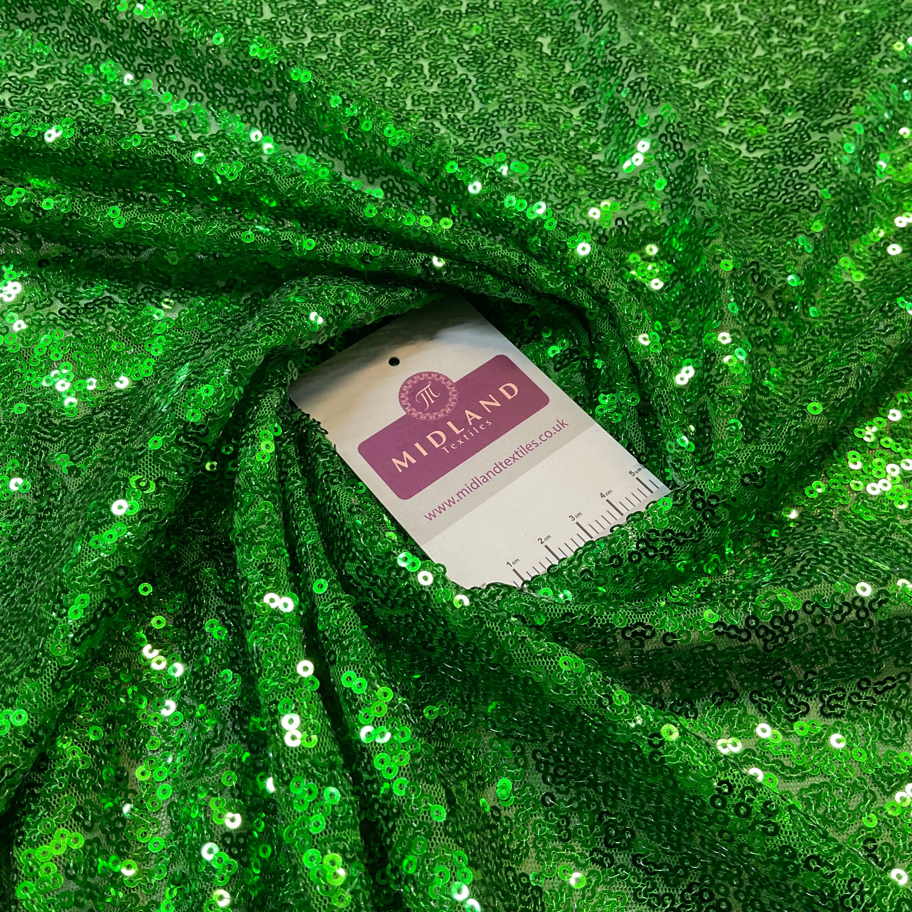 SENSATIONAL 3MM SEW ON ALL OVER SEQUINS ON NET FABRIC 50' WIDE DRESS FABRIC M1797 MTEX