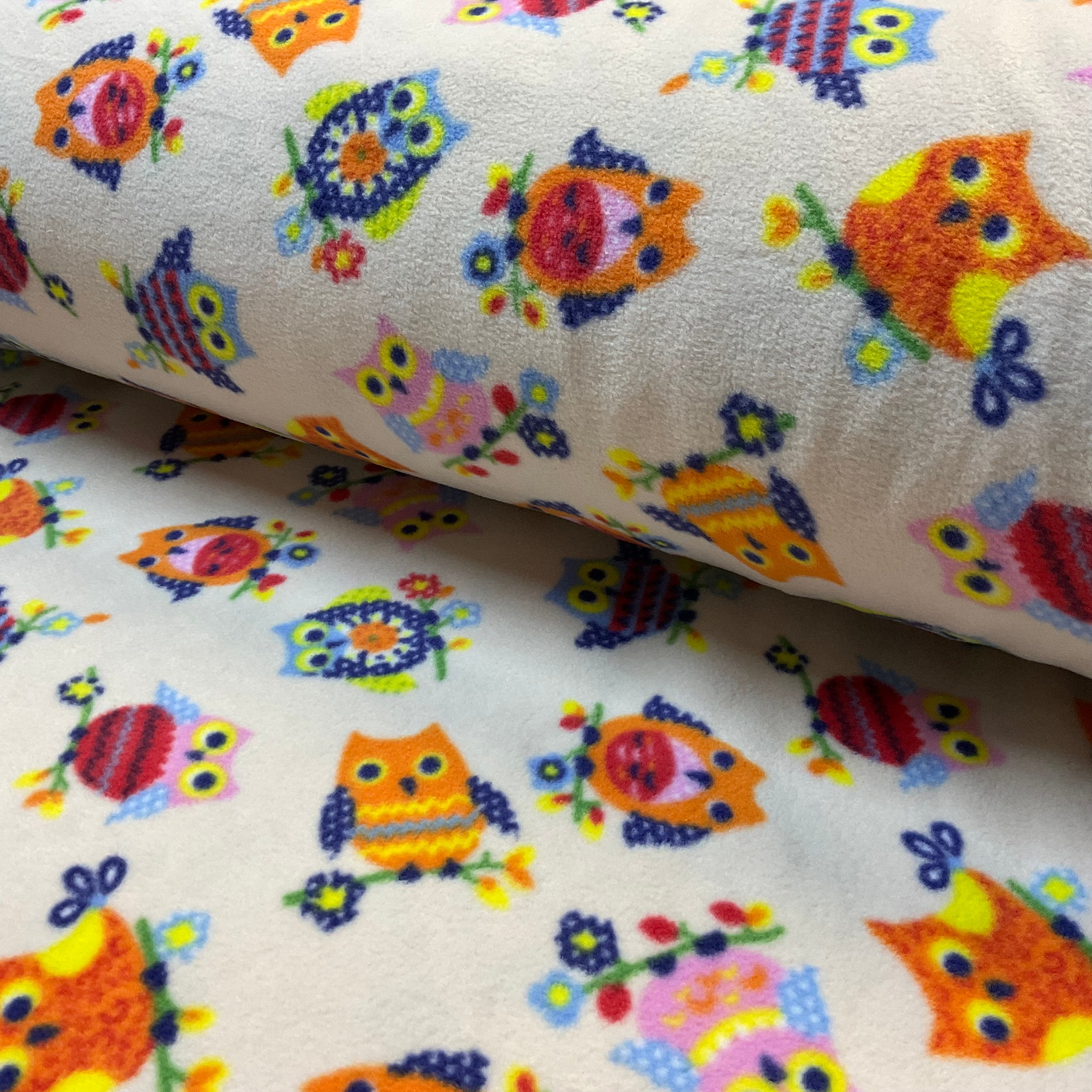 Colourful owls on cream anti pil fleece ideal for Blankets & throws fabric 150cm wide M2067-7