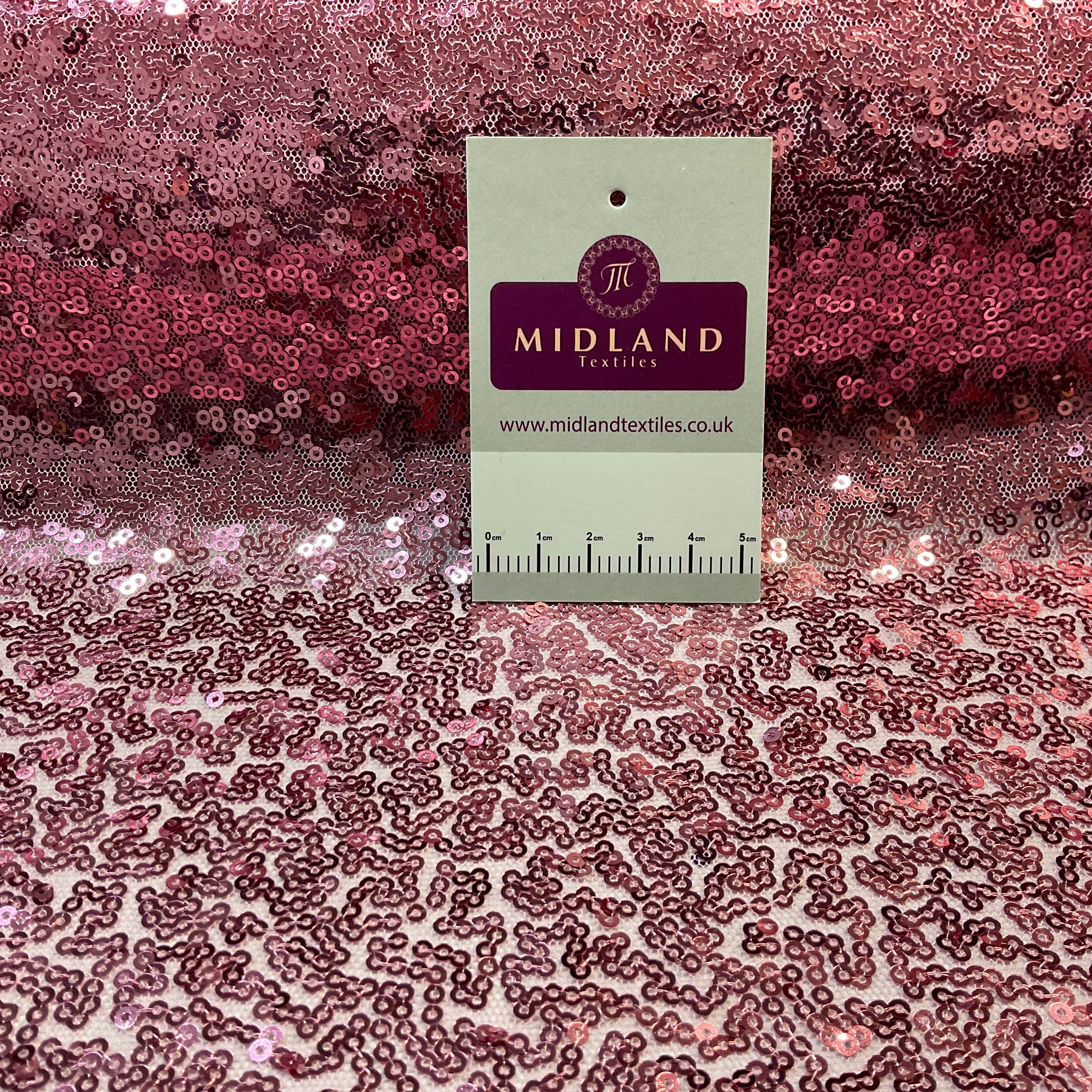 SENSATIONAL 3MM SEW ON ALL OVER SEQUINS ON NET FABRIC 50' WIDE DRESS FABRIC M1797 MTEX