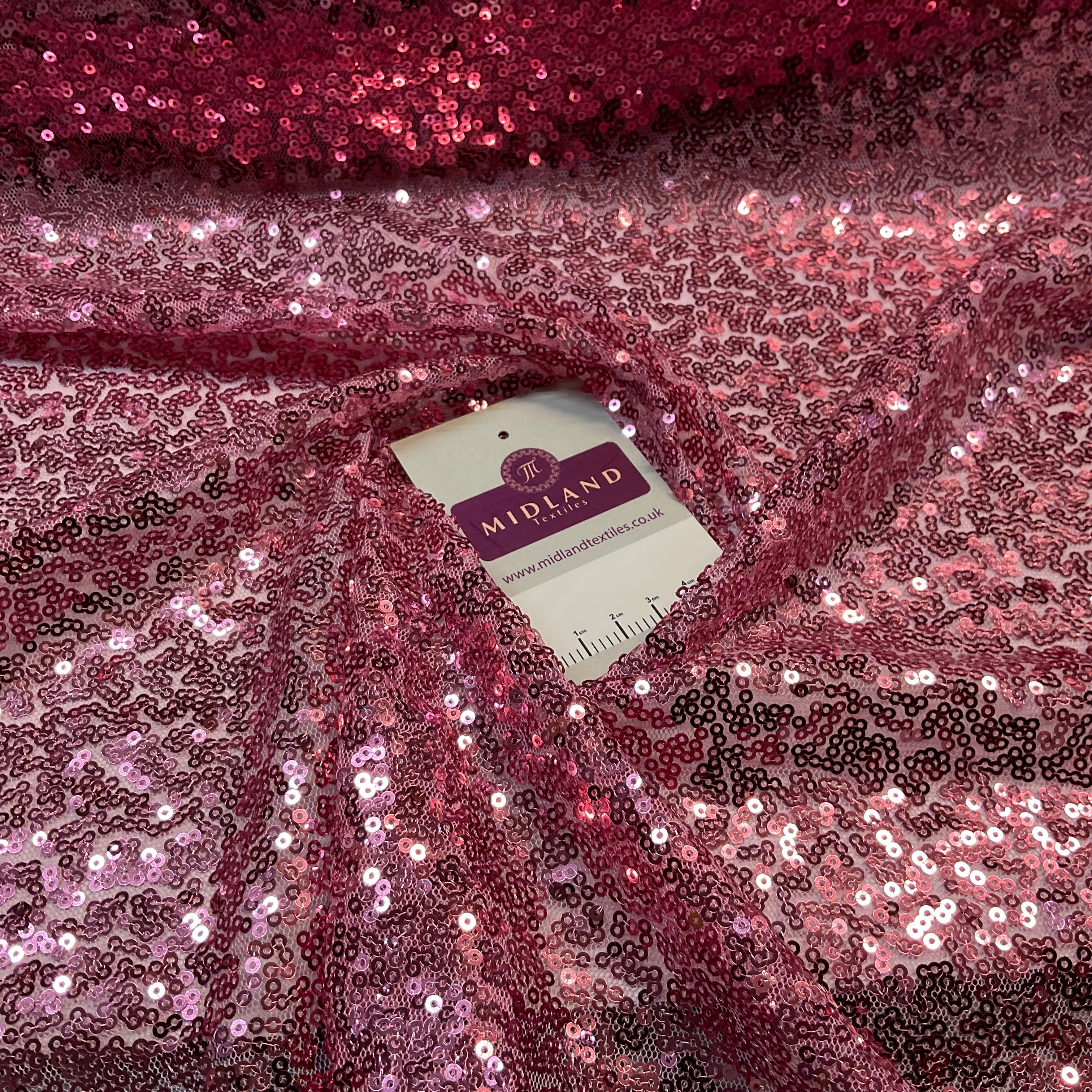 SENSATIONAL 3MM SEW ON ALL OVER SEQUINS ON NET FABRIC 50' WIDE DRESS FABRIC M1797 MTEX