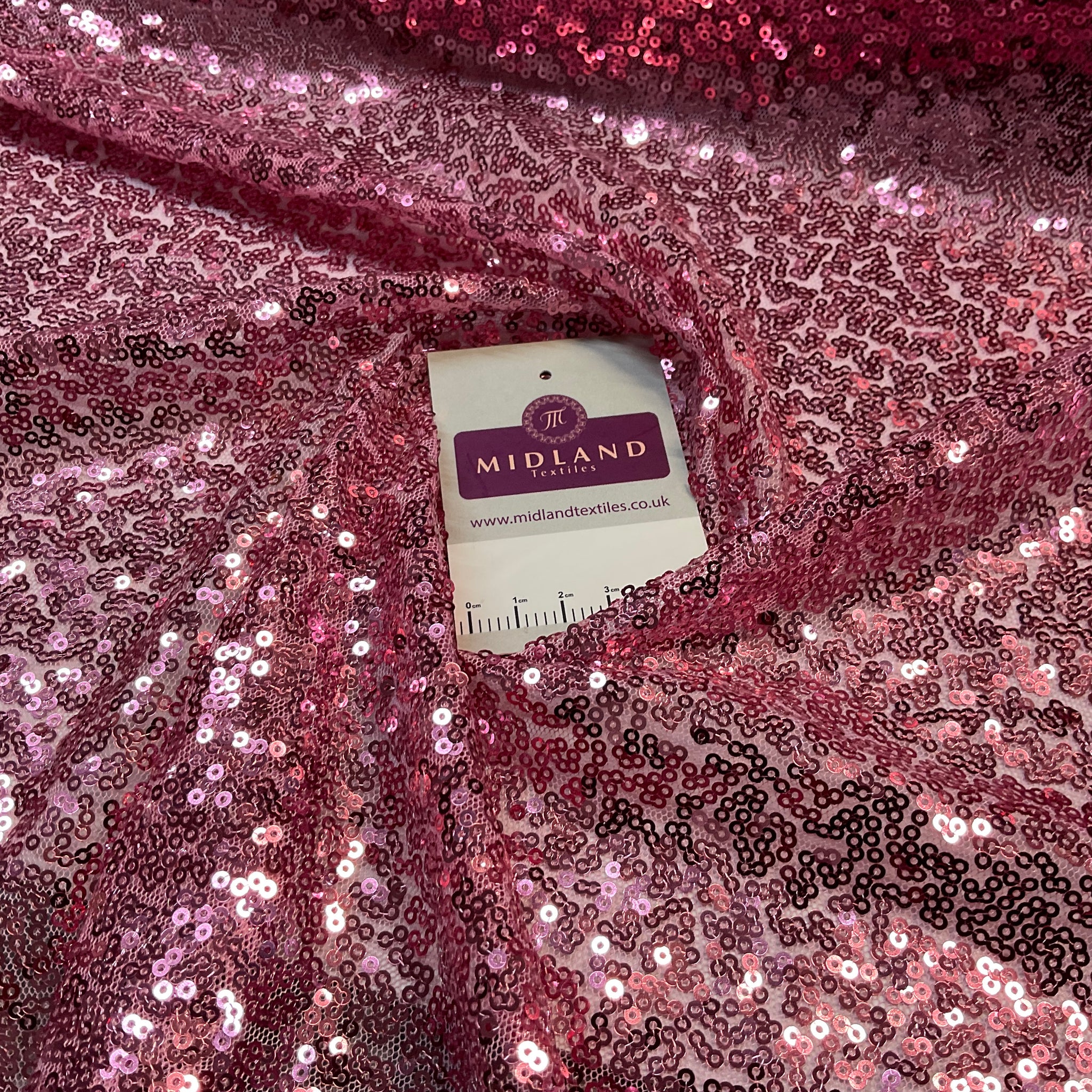 SENSATIONAL 3MM SEWN ALL OVER SEQUINS ON NET FABRIC 50" WIDE DRESS FABRIC M1797 MTEX