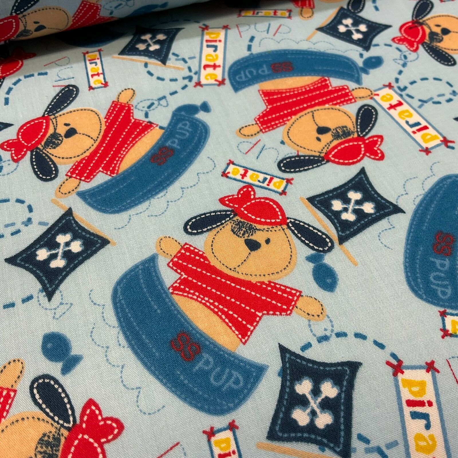 Blue Pirate Puppy Novelty Children Poly cotton printed lightweight fabric M1626