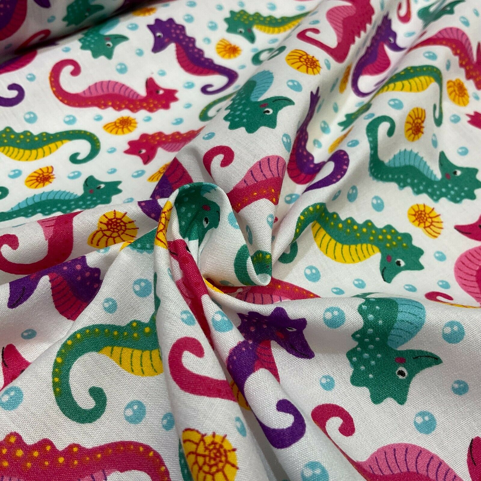 Colourful White Seahorses Poly cotton printed lightweight fabric M1624