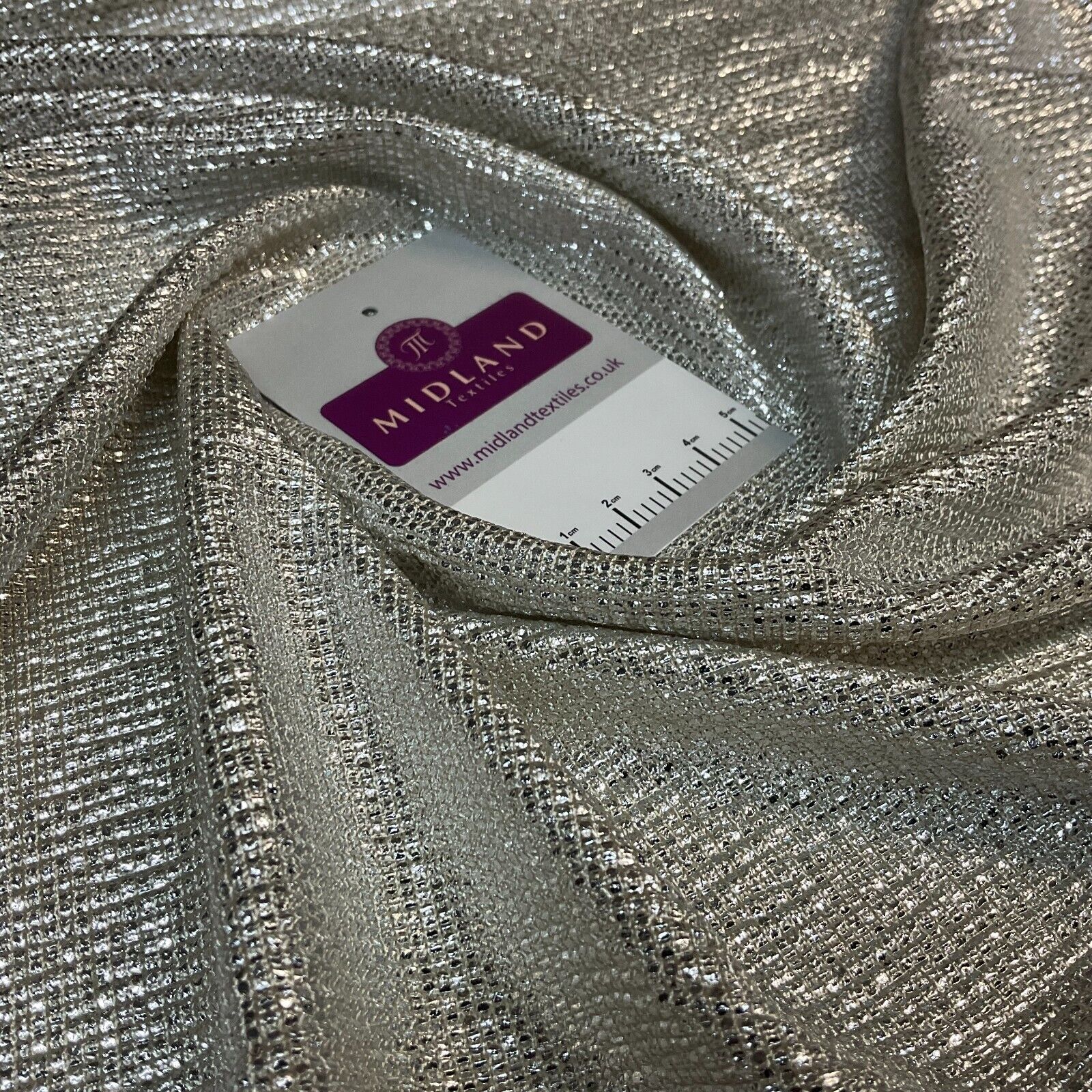 Jersey Foil Silver On Cream One way stretch Hologram Textured dress fabric M1740