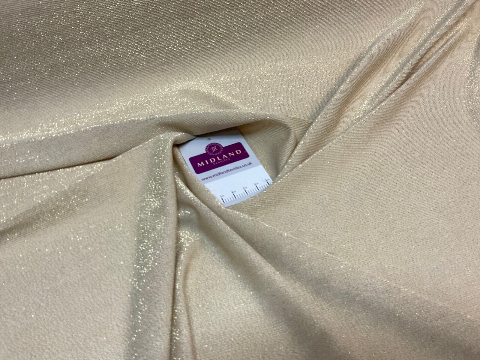 Gold Jersey Stretch Shimmer Metalic dress fabric M1783