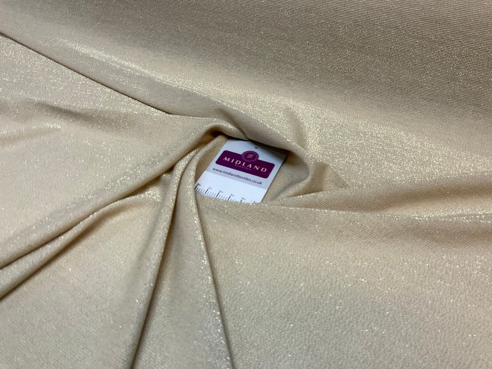 Gold Jersey Stretch Shimmer Metalic dress fabric M1783