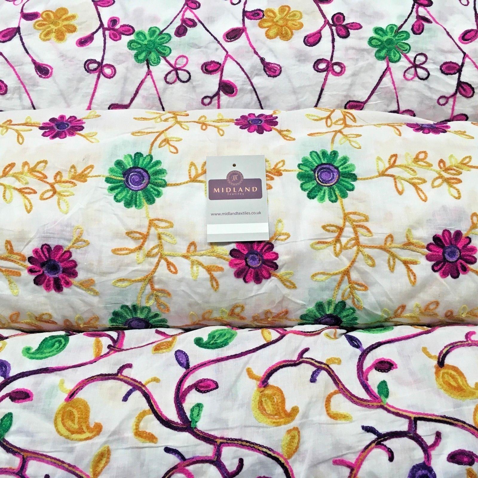 White Cotton with multicoloured wool embroidered dress fabric 54' Wide M1000