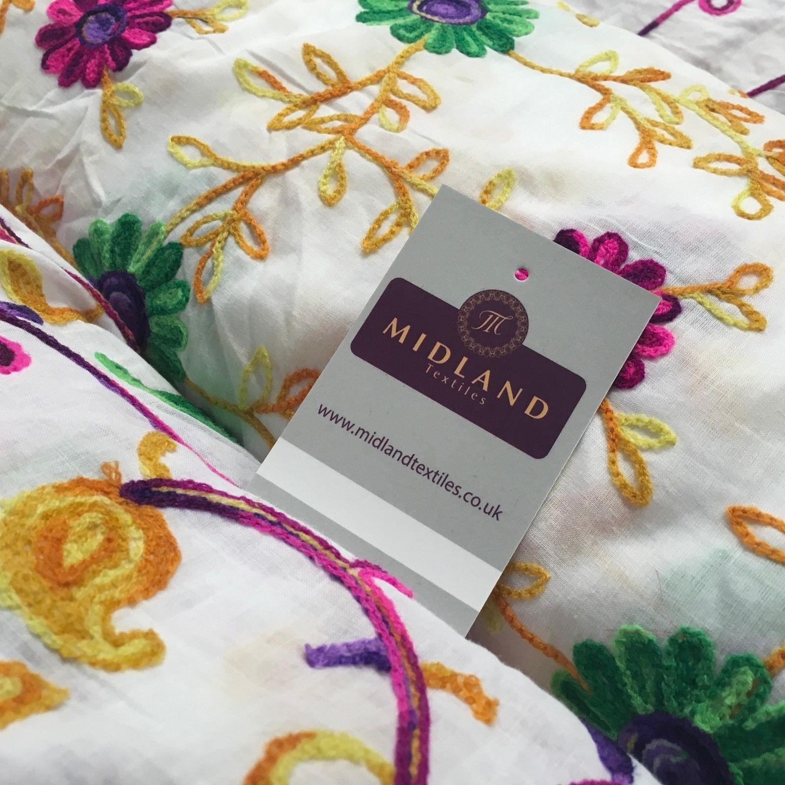 White Cotton with multicoloured wool embroidered dress fabric 54' Wide M1000