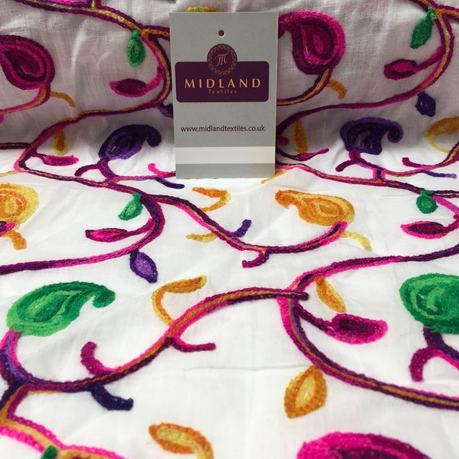White Cotton with multicoloured wool embroidered dress fabric 54' Wide M1000