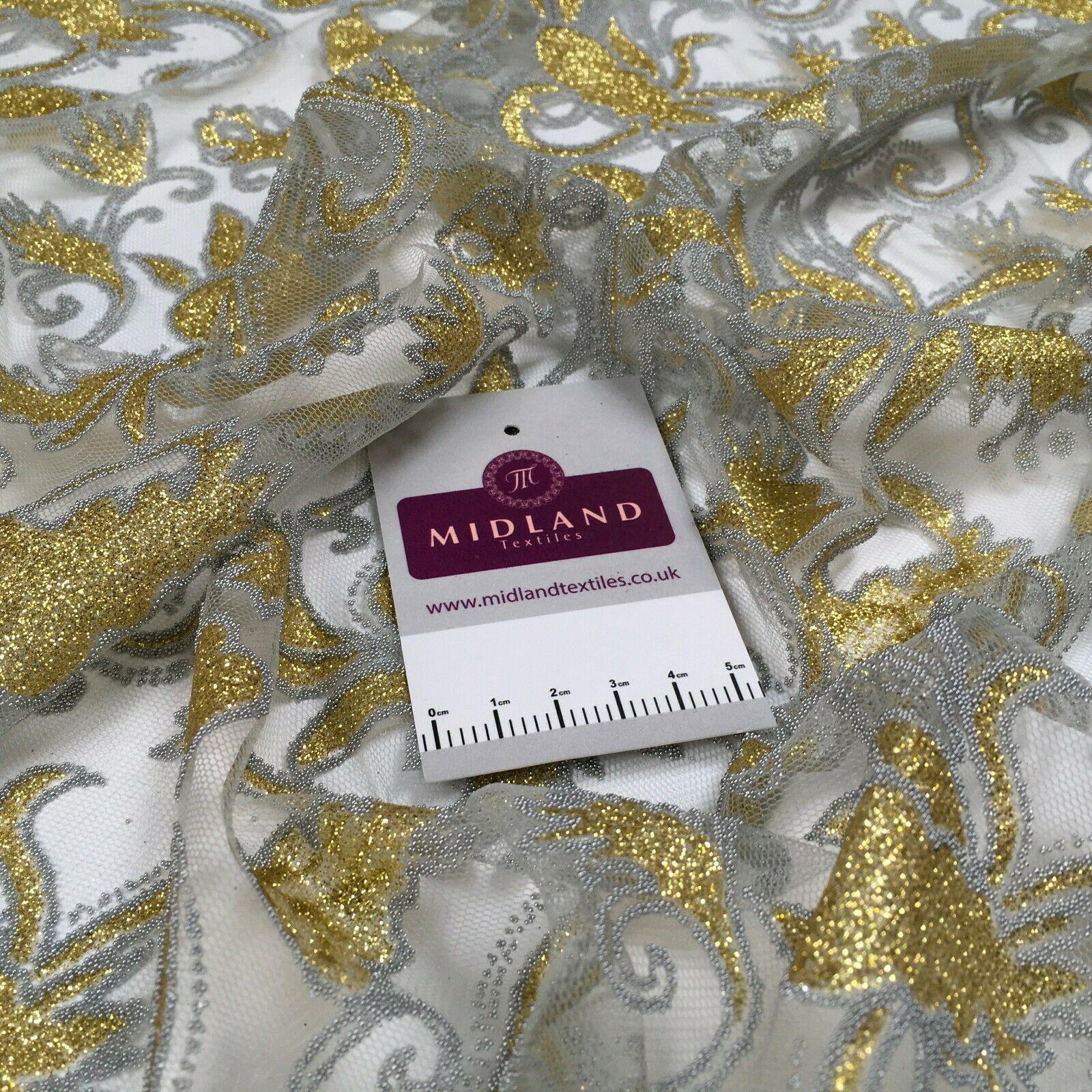 Gold on Grey ornamental net mesh dress fabric 140 cm M186-61 Mtex